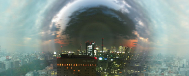 Cityscape with bubble of night surrounded by day.